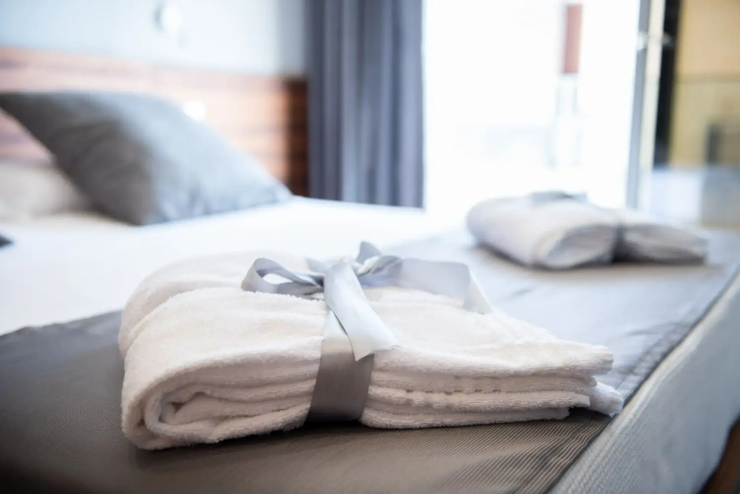 Drap sur le lit dans une chambre du Clos Sibade Tarn et Garonne